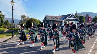 Pipe Band lead the Braemar Royal Highland Society on the march to 2024 Braemar Gathering in Scotland [upl. by Akemak]