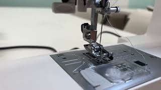 How to use the threader on your sewing machine  Elna eXperience 550 [upl. by Annaeirb]