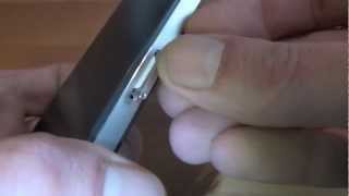 How to insert a SIM Card into Apple iphone 4 [upl. by Alihet]