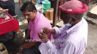 Ear Cleaners see business from men and not from women along Indias streets roadside hygiene [upl. by Ysset326]