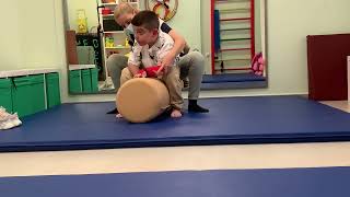 NDT therapy to a quadriplegic dystonic child with CP Roll therapy for sitting position [upl. by Aciemaj195]