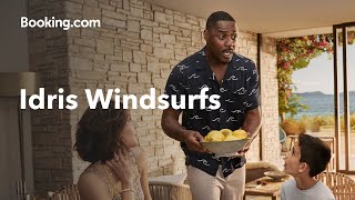 Bookingcom  Idris Elba Windsurfs onto a Beach [upl. by Ebony517]