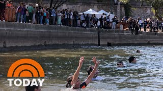 Mayor of Paris follows through on promise to swim in Seine [upl. by Hamel]