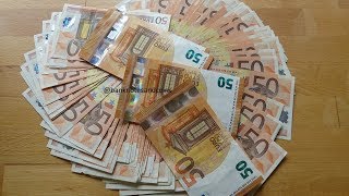 Counting a stack of 50 Euro banknotes [upl. by Eyssej]