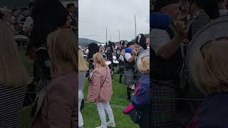 The massed pipes and drums at Ballater Highland Games scotland highlandgames bagpipes [upl. by Evanne]