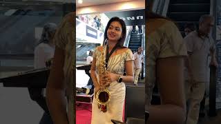 එයත් ලස්සනයි වාදනයත් ලස්සනයි Saxophone playing beautifull Girl in public [upl. by Fischer]