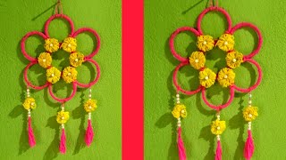 Super Easy Woolen Flower Wall Hanging Craft l Woolen Thread Craft Ideas Woolen Wall Hanging Design [upl. by Wylma]