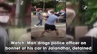 Watch Man drags police officer on bonnet of his car in Jalandhar detained [upl. by Devonna]