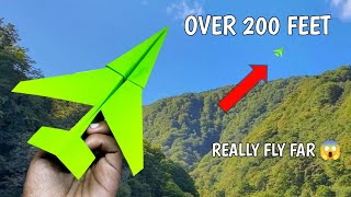 Over 200 feet How to make a paper airplane that flies far [upl. by Lilak]