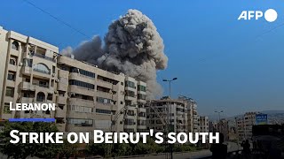 Israeli strike hits Beiruts southern suburbs  AFP [upl. by Dnalra]