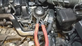 How To Remove A Stuck Oil Filter Cap [upl. by Trout]