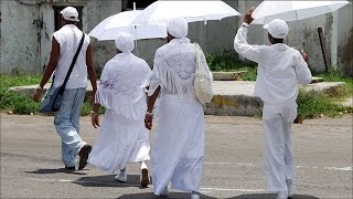 PORQUE LOS SANTEROS NOS VESTIMOS DE BLANCO Y NOS TAPAMOS LA CABEZA [upl. by Arbe]