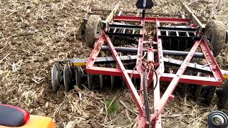 Kubota M7060 discing my buddies corn field [upl. by Penrose]