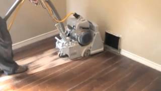 Refinishing Hardwood Floors Part 1 Sanding [upl. by Oisorbma]