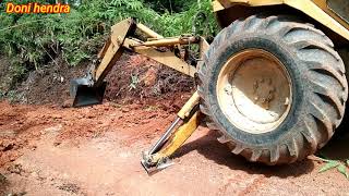 Backhoe Case 580G memperbaiki jalan kebun  main Road [upl. by Hollie146]