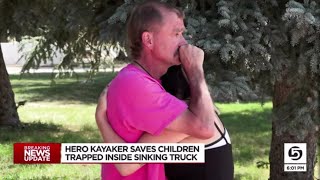 Hero kayaker saves children trapped inside sinking truck [upl. by Fredric967]