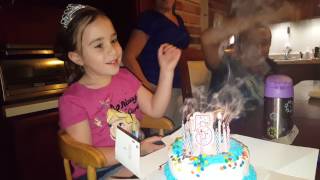 Alexis blows out the relighting trick candles on her 5th birthday cake [upl. by Gauldin]