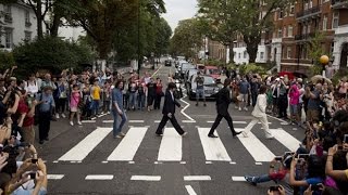 Beatles Abbey Road crossing packed for 45th anniversary [upl. by Htehpaj]