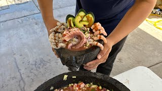 Una campechana en Molcajete con pulpo camarón caracol y pescado [upl. by Lilith]