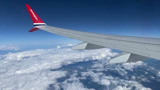 Flying above the clouds with Boeing 737 Max Norwegian Airlines 4K [upl. by Adali246]